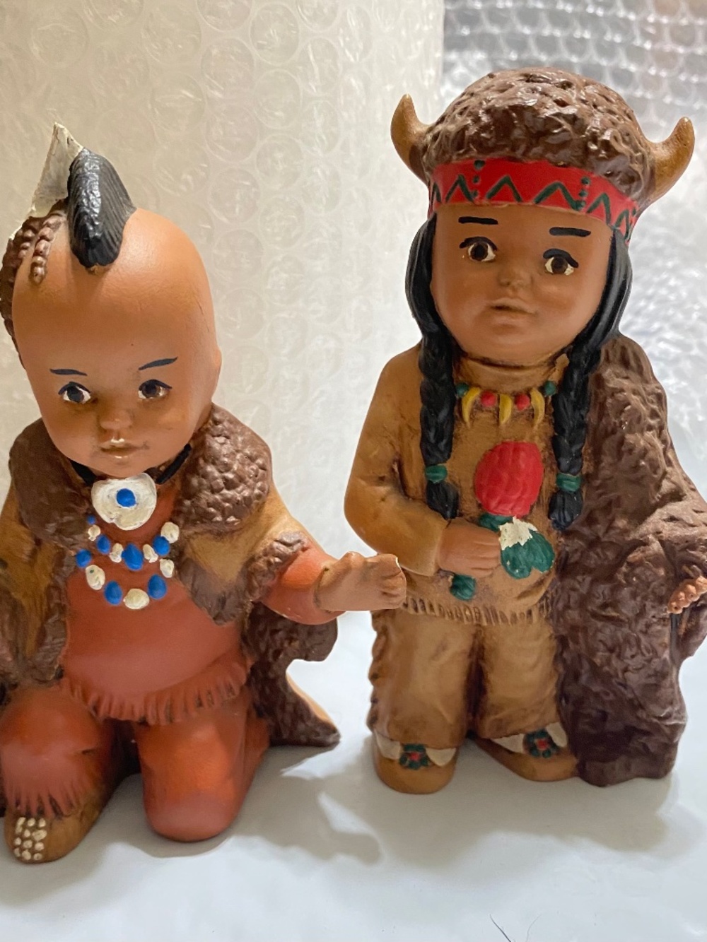 2 hand painted ceramic figurines from a vintage nativity American themed set.